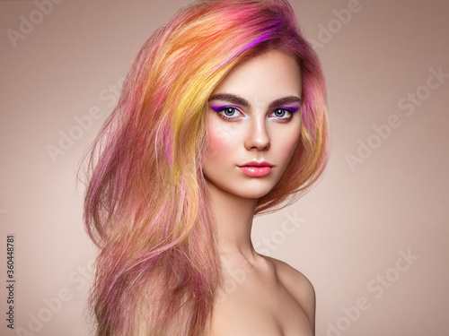Beauty Fashion Model Girl with Colorful Dyed Hair. Girl with Perfect Makeup and Hairstyle. Model with Perfect Healthy Dyed Hair