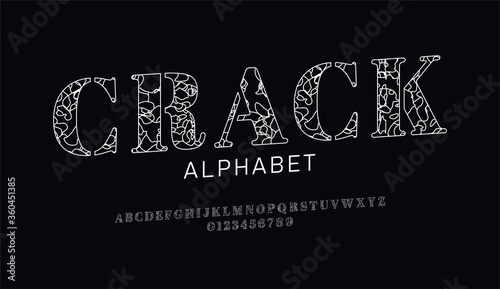 Set of font letters and numbers with decorative сracked surface. Broken effect. Isolated white alphabet on black background. Outline style