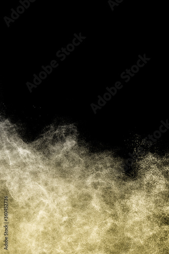 gold powder explosion with black space on top