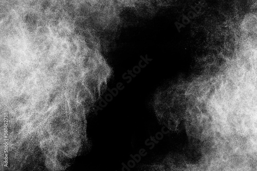 white powder explosion with black space on center