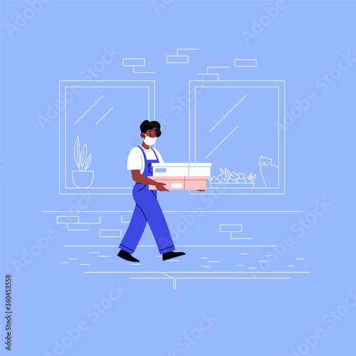 Delivery girl on her way to a client with two boxes walking down the street wearing medical face mask