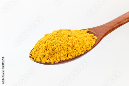Curry powder on white background