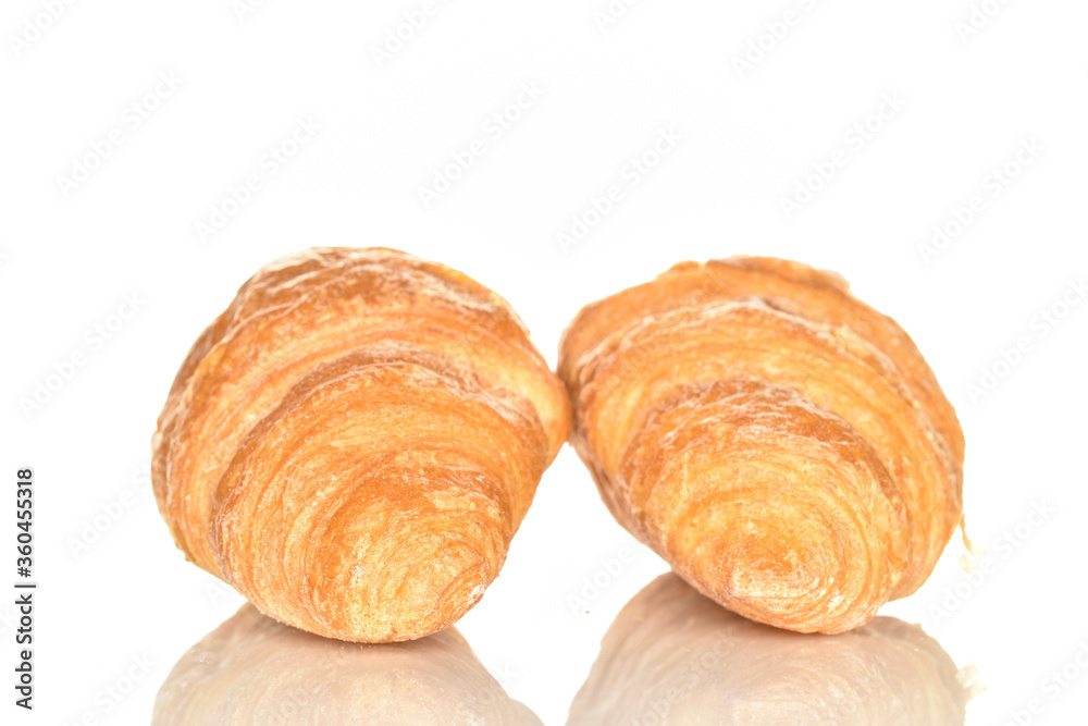 Homemade croissants, close-up, on a white background.