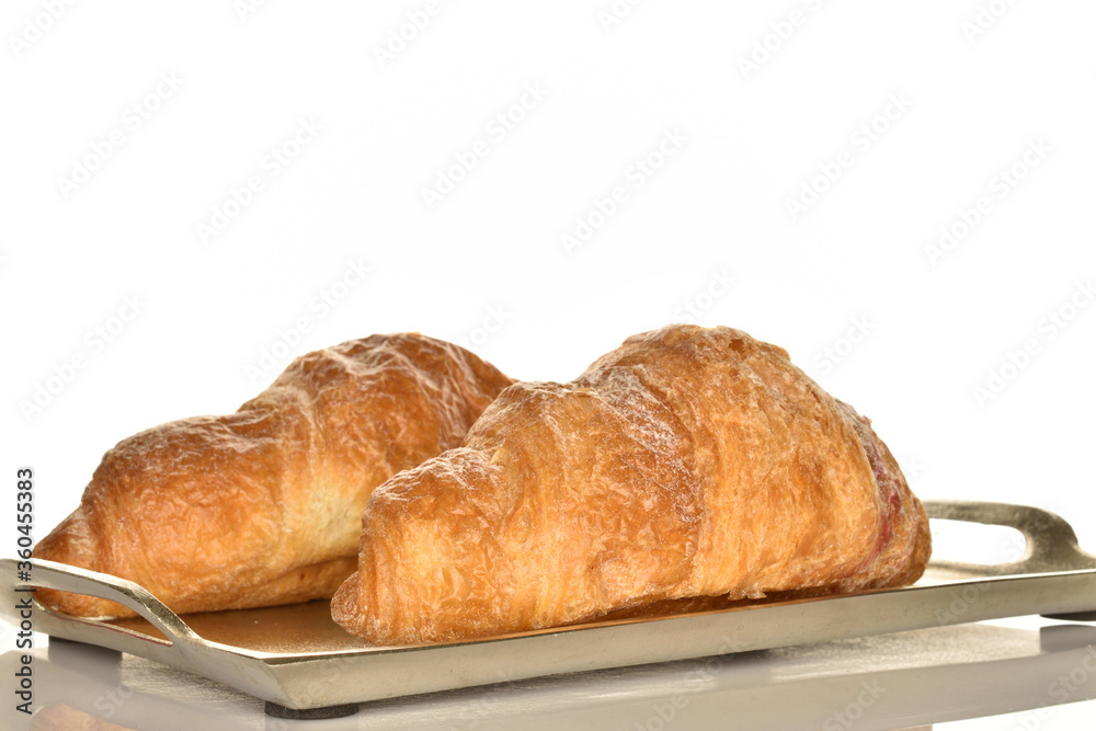 Homemade croissants, close-up, on a white background.