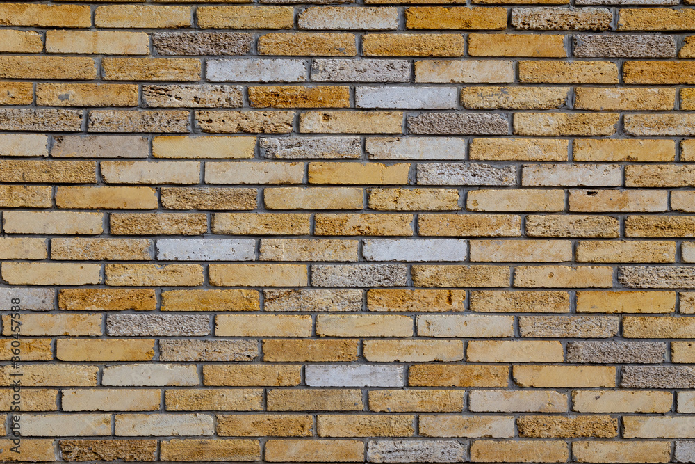 Fototapeta premium Brick wall with old vintage bricks background or texture.