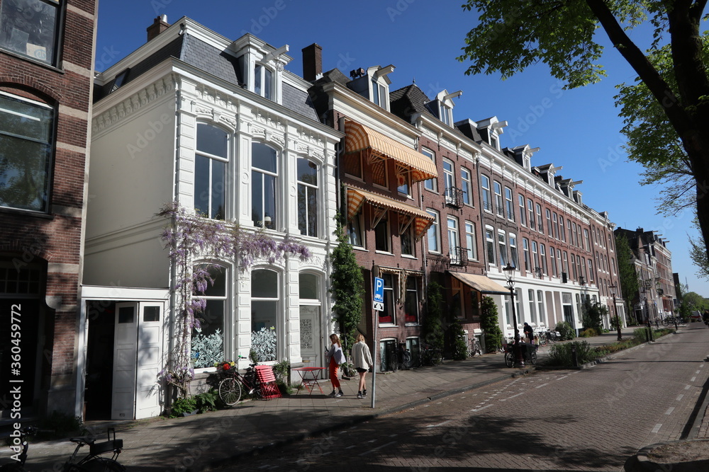 Amsterdam, North-Holland, The Netherlands - April 2, 2020: houses at the Ruysdealkade