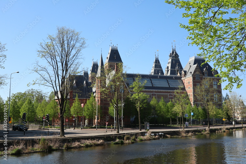 Amsterdam, North-Holland, The Netherlands - April 2, 2020: Rijksmuseum seen from the Ruysdaelkade