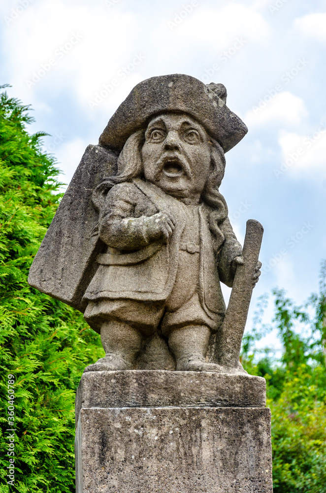 Statue of a dwarf (carved by workshop of baroque sculptor Matthias Bernard Braun) in the garden of the castle, Nove Mesto nad Metuji, Czech republic.