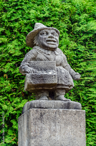 Statue of a female dwarf (carved by workshop of baroque sculptor Matthias Bernard Braun) in the garden of the chateau, Castle of Nove Mesto nad Metuji, Czech republic