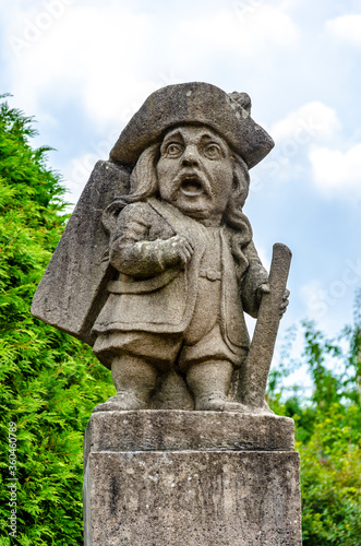 Statue of a dwarf (carved by workshop of baroque sculptor Matthias Bernard Braun) in the garden of the castle, Nove Mesto nad Metuji, Czech republic.
