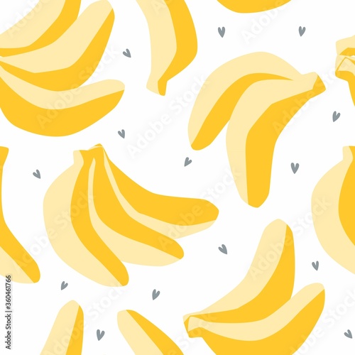 Yellow banana and grey tiny heart vector seamless pattern with tropical fruit silhouette for toddler girl clothing or duvet cover textile print. 