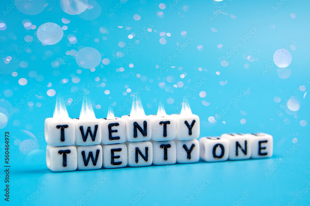 2021 happy new year dice word text on blue background with plenty copy space 2021 happy new year dice word text on blue background with plenty copy space