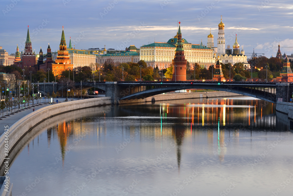 Moscow Kremlin on Moskva River. Bolshoy Kamenny Bridge. Early morning. Illumination. Moscow Kremlin on Moskva River. Bolshoy Kamenny Bridge. Early morning. Illumination.