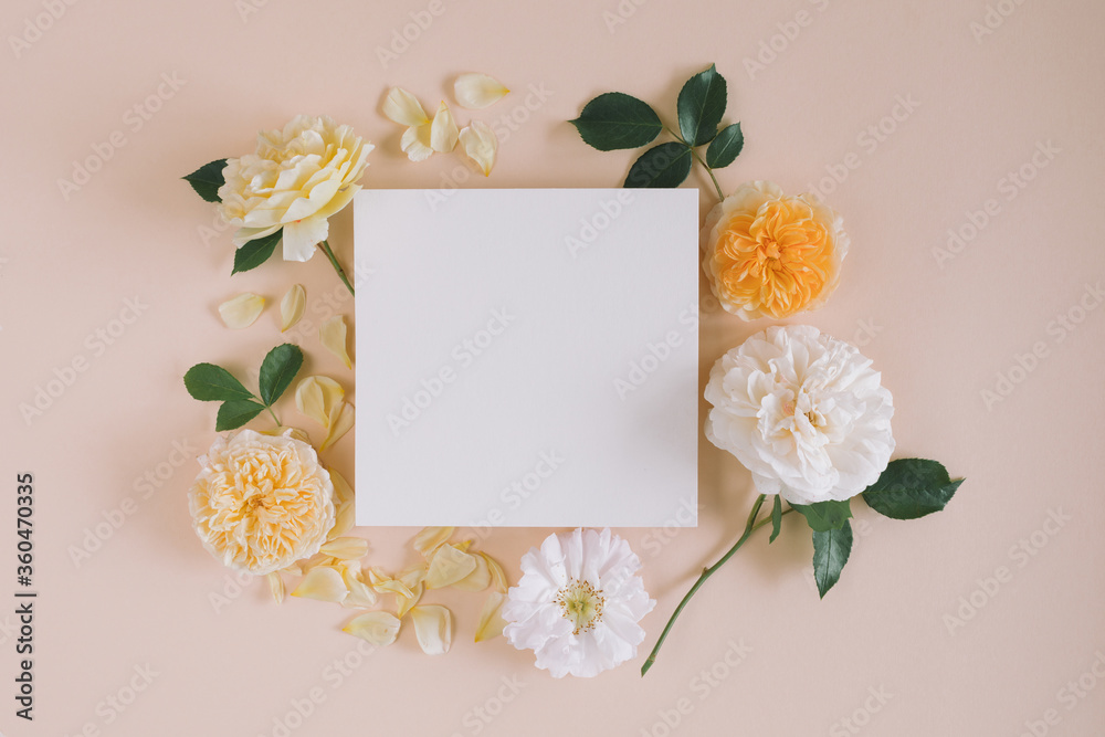 Framework for photo or congratulation. Blank paper mock up with floral composition.