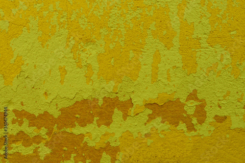 Yellow-orange background for design and text. Yellow-orange paint applied one on top of the other © Maksim