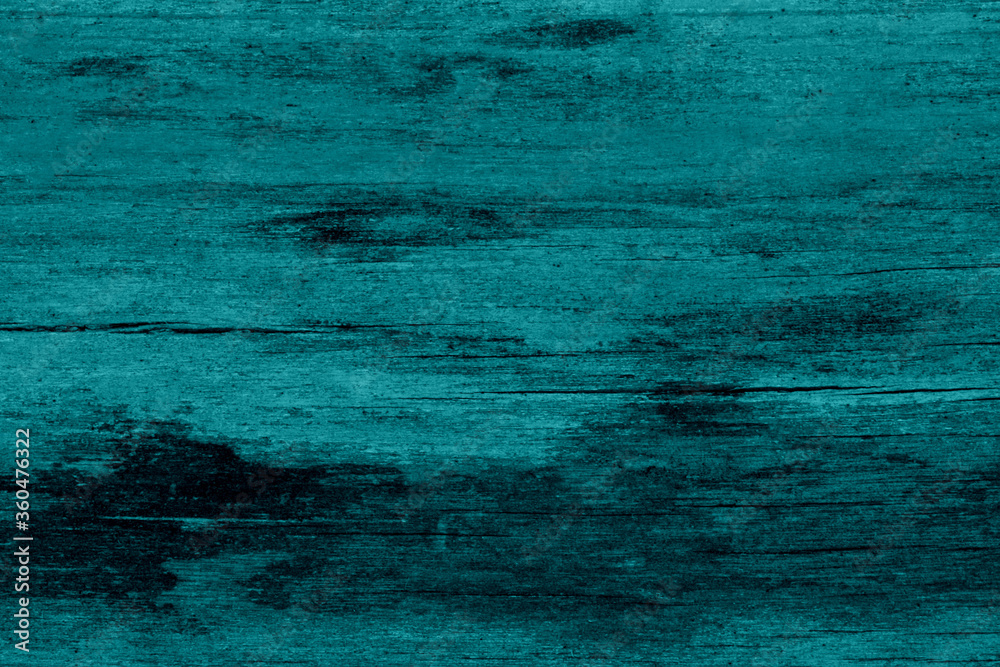Abstract empty turquoise wooden textured background. Texture of a blue old shabby wooden background. The structure of a vintage turquoise painted coating of wood. Abstract empty turquoise wooden textured background. Texture of a blue old shabby wooden background. The structure of a vintage turquoise painted coating of wood.
