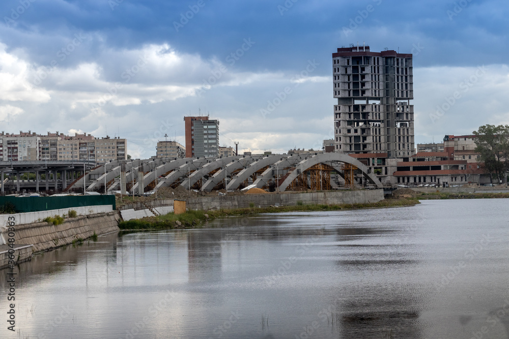 A building under construction on the banks of the Miass River in Chelyabinsk.