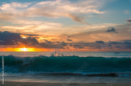 Ocean at sunset waves and bright sky