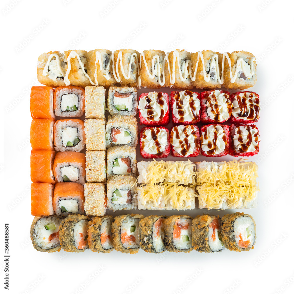 Japanese cuisine. Seafood, vegetables and meat. Sushi and rolls big set isolation on a white background