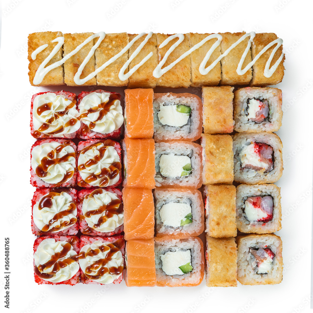 Japanese cuisine. Seafood, vegetables and meat. Sushi and rolls big set isolation on a white background