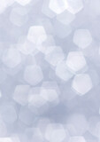 silver background with heart shape snow bokeh out of focus 