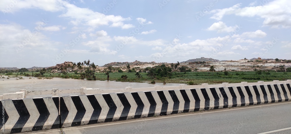 river that is across the historical town hampi , lakes river that is across the historical town hampi , lakes