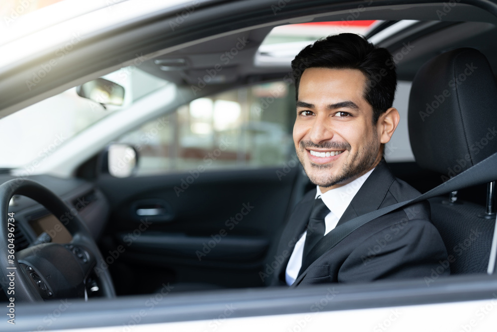 Confident Businessman In Car
