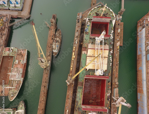 repair vessels hull  (ship, tanker) in shipyard