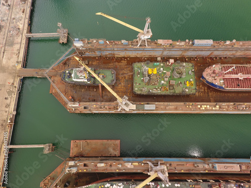 repair vessels hull  (ship, tanker) in shipyard photo