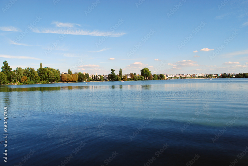 Beautiful view of the lake in a city park. Beautiful view of the lake in a city park.