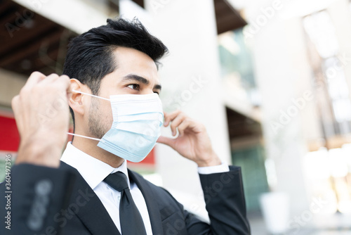 Latin Businessman Wearing Face Mask