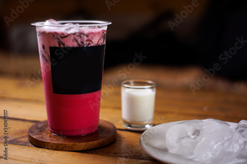 variant of cold drinks with fruit flavor. fresh cafe menu with dark background. colorful ice mockups with plastic cups. grape, chocolate, strawberry, mango, grass jelly, blueberries, guava