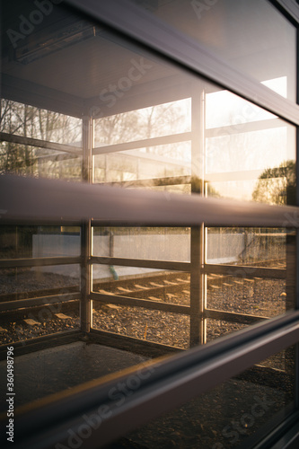 Entrance to a public transportation train station in sunset
