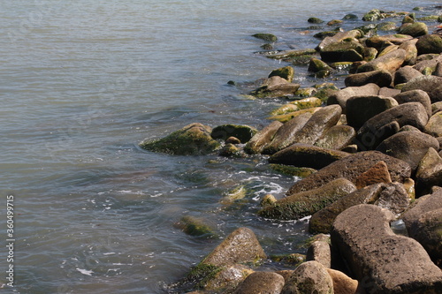 Sea pebble. Sea stones background. Ocean beach rocks.