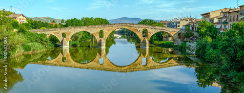 Puente de la Reina in Saint James Way bridge over Arga River in Pamplona photo