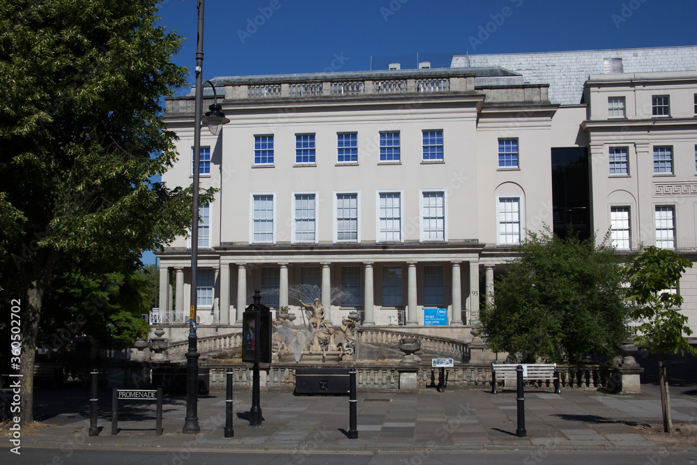 Obraz premium A view of The Promenade and Neptune's Fountain in Cheltenham, Gloucestershire, United Kingdom