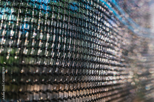 Close-up detail of the knots of a fine-mesh nylon mesh.
