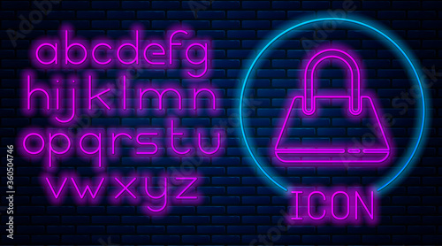 Glowing neon Handbag icon isolated on brick wall background. Female handbag sign. Glamour casual baggage symbol. Neon light alphabet. Vector Illustration.
