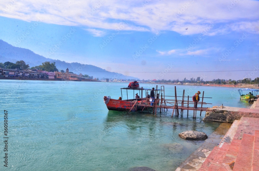Boats in bay of Ganga river in Uttarakhand, India. Boats in bay of Ganga river in Uttarakhand, India.