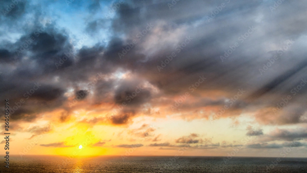 Amazing aerial view of beautiful sunset over the ocean