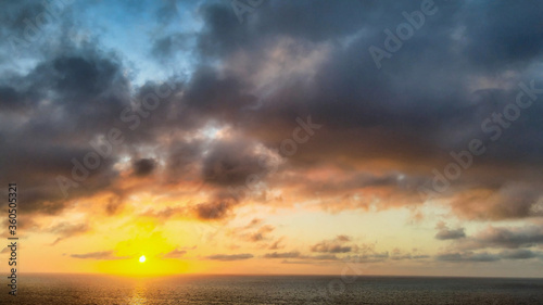 Amazing aerial view of beautiful sunset over the ocean