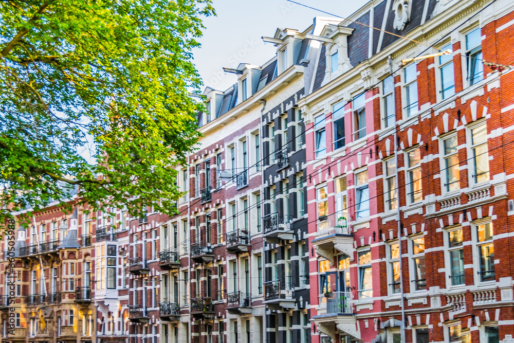 Picturesque traditional Dutch houses in Amsterdam, Holland.