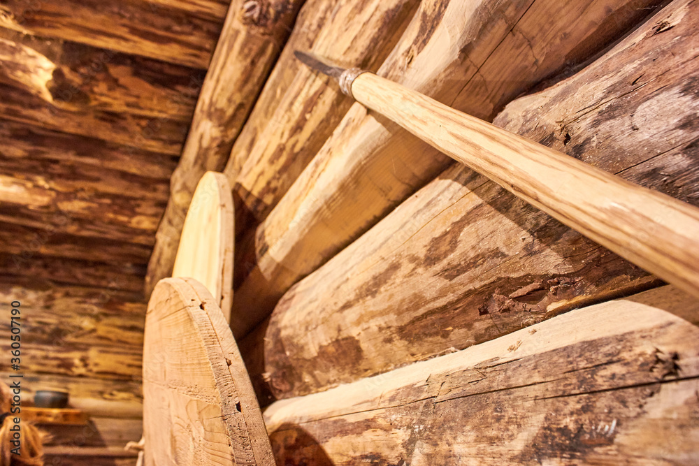 Interior of wooden museum and some exhibits 