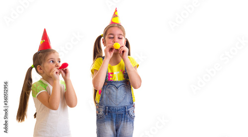 Funny two girls friends with birthday or party decorations