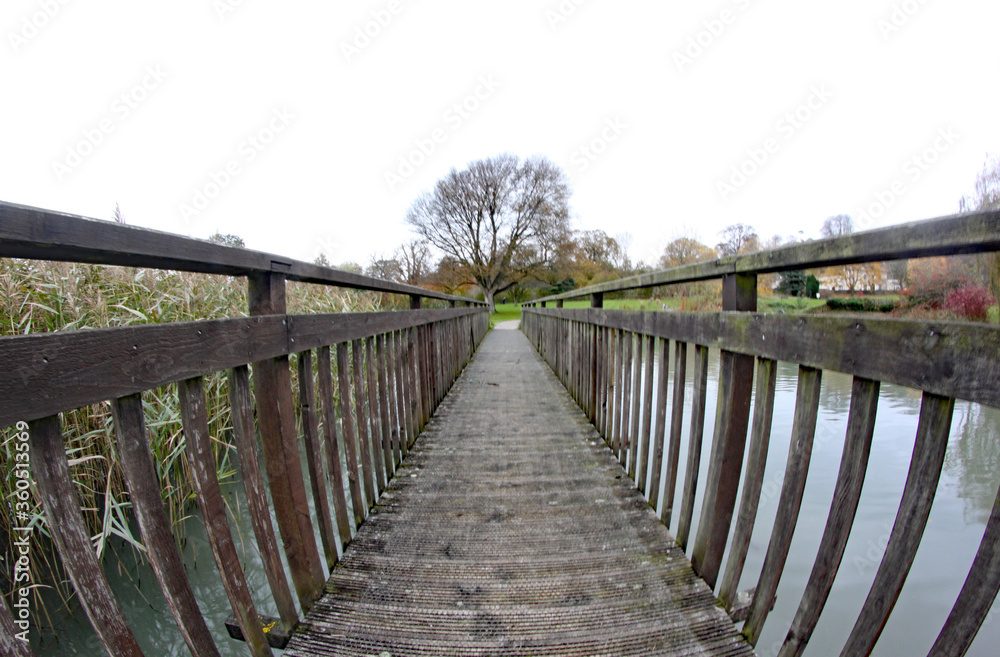 An old wooden bridge taken with a fish eye lens, giving a distorted effect