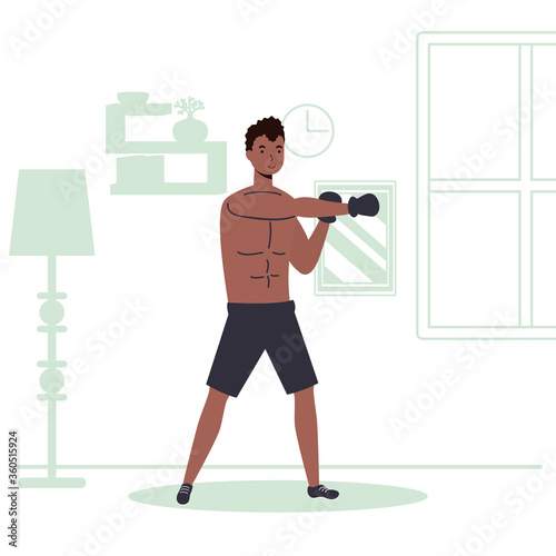afro man practicing boxing sport activity in the house