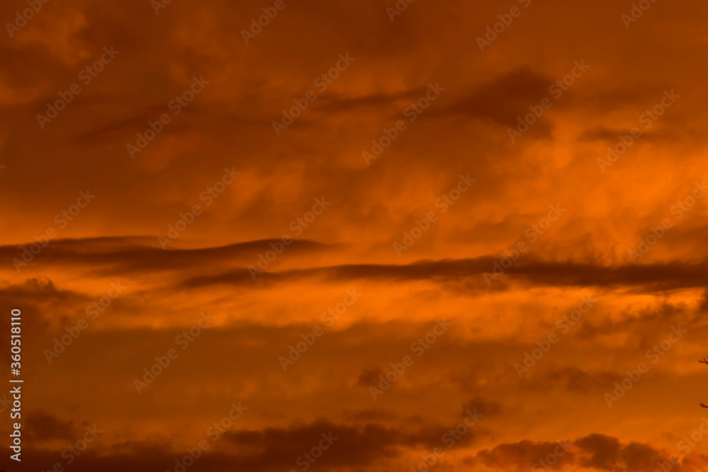 Fototapeta premium Orange cloudscape at sunset