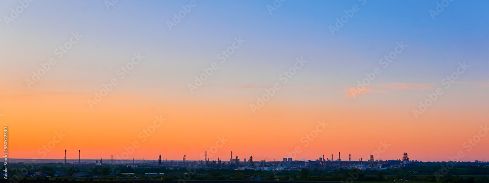 industrial silhouette landscape under the sunset sky