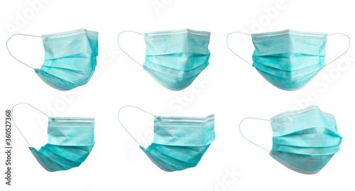 Medical face mask isolated on white background with clipping path around the face mask and the ear rope. Concept of COVID-19 or Coronavirus Disease 2019 prevention by wearing face mask. photo