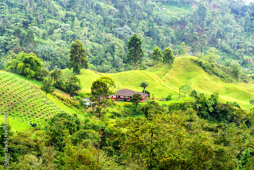 Farmhouse lodge in the rural mountainous part of Colombia located among rolling hills and coffee plantations.
